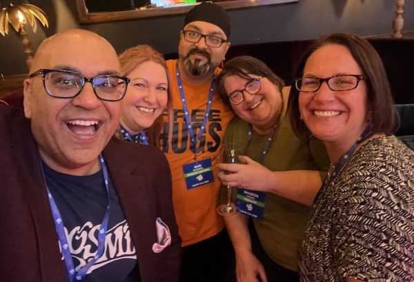 A group of 2025 attendees enjoying the pre-party networking